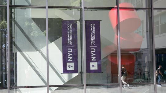 exterior shot of campus building with NYU Tandon banner