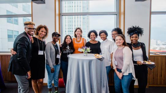 Group photo of students of color with Dean Farrington and Dean Jelena