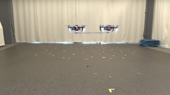 two drones flying in sync