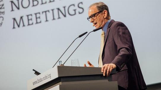 Hellman at lectern