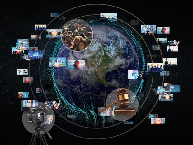 globe with many smaller images surronding it of people, a gavel and video camera