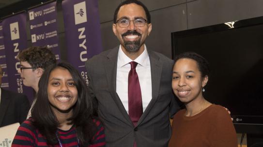 John B. King, Jr. with students