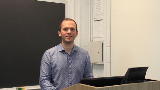 student standing at podium