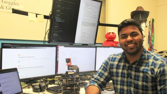 student at lab desk